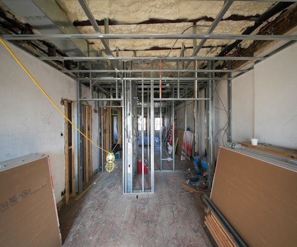 Interior construction with metal framing and drywall panels